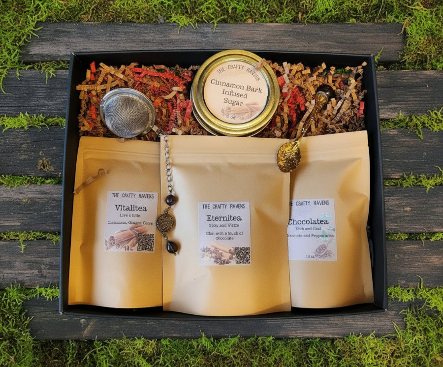 Box of 'The Crafty Raven' products including bags, a jar, and a spoon with decorative elements.